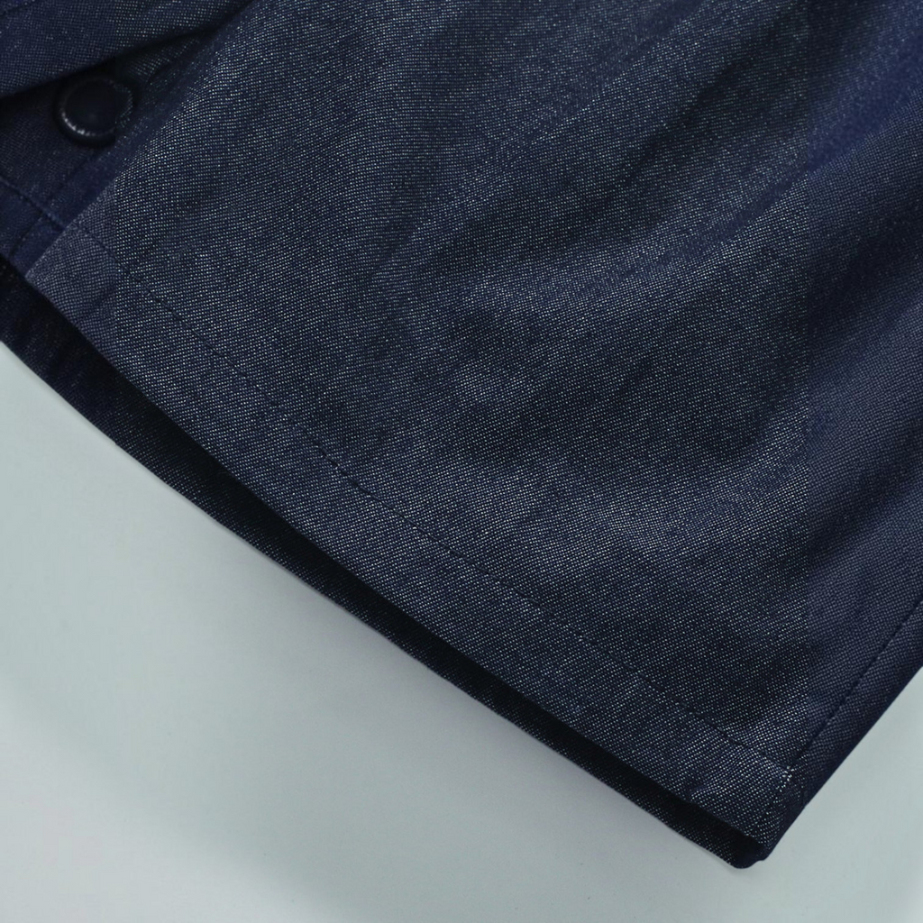 BabyEase dark wash denim shorts featuring a durable fabric texture and a simple button detail on the waistband.