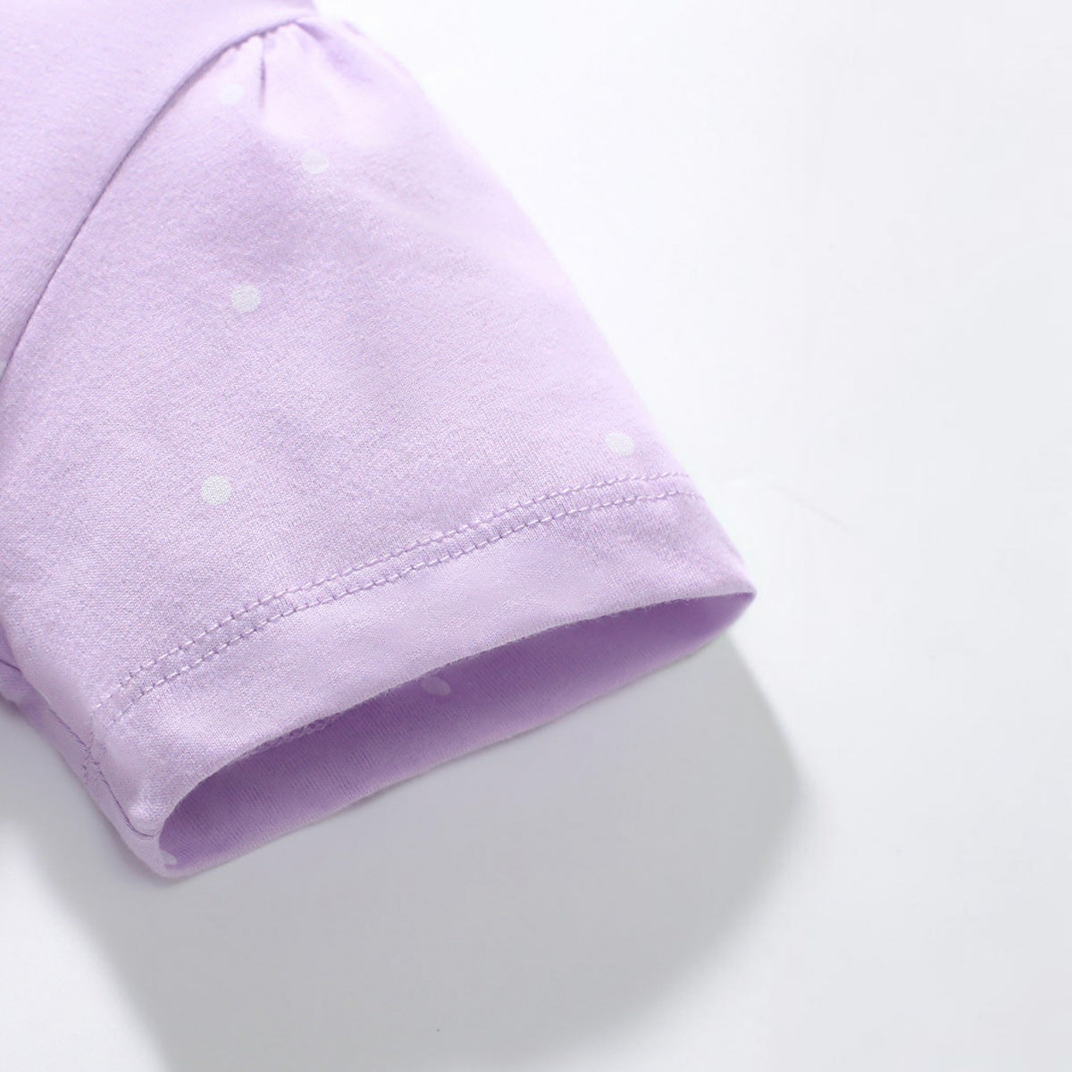 BabyEase lavender short sleeve dress with white polka dot pattern on soft cotton fabric